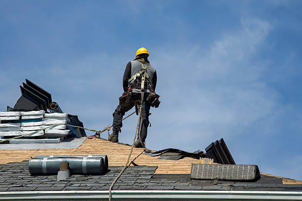 Professional Roof Replacement technician working in Timber, OR